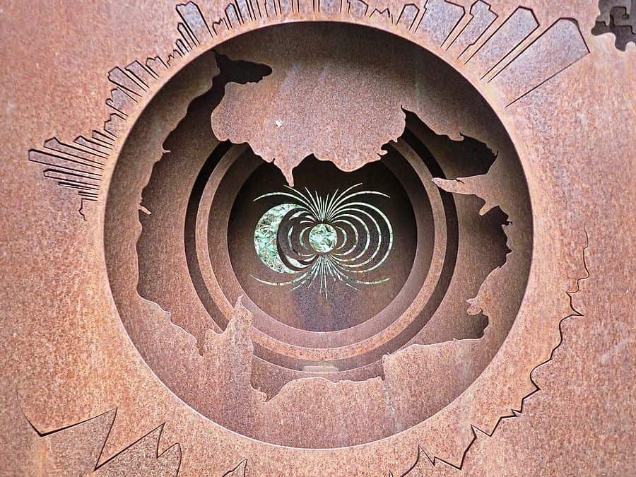 Intricate concentric profiles cut clean through weathering steel plate
